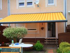 Markise orange-gelb-gestreift