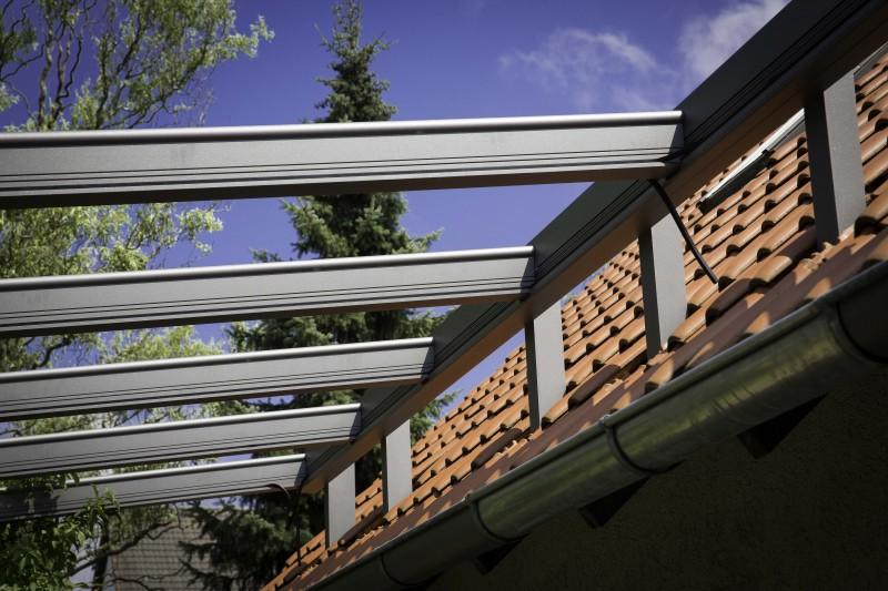 Terrassenüberdachung integriert in Hausdach