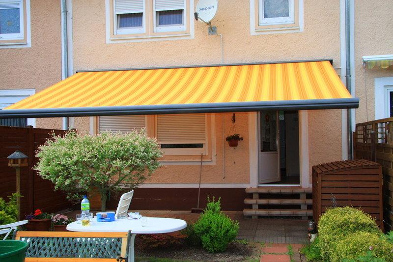 Markise orange-gelb-gestreift